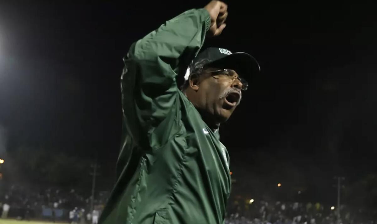 Dorsey coach Paul Knox celebrates miracle win in 2001 City championship game at Coliseum.