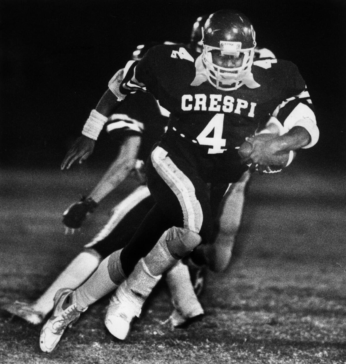 Crespi's Russell White carries the ball during a game against St. John Bosco on Nov. 7, 1986.