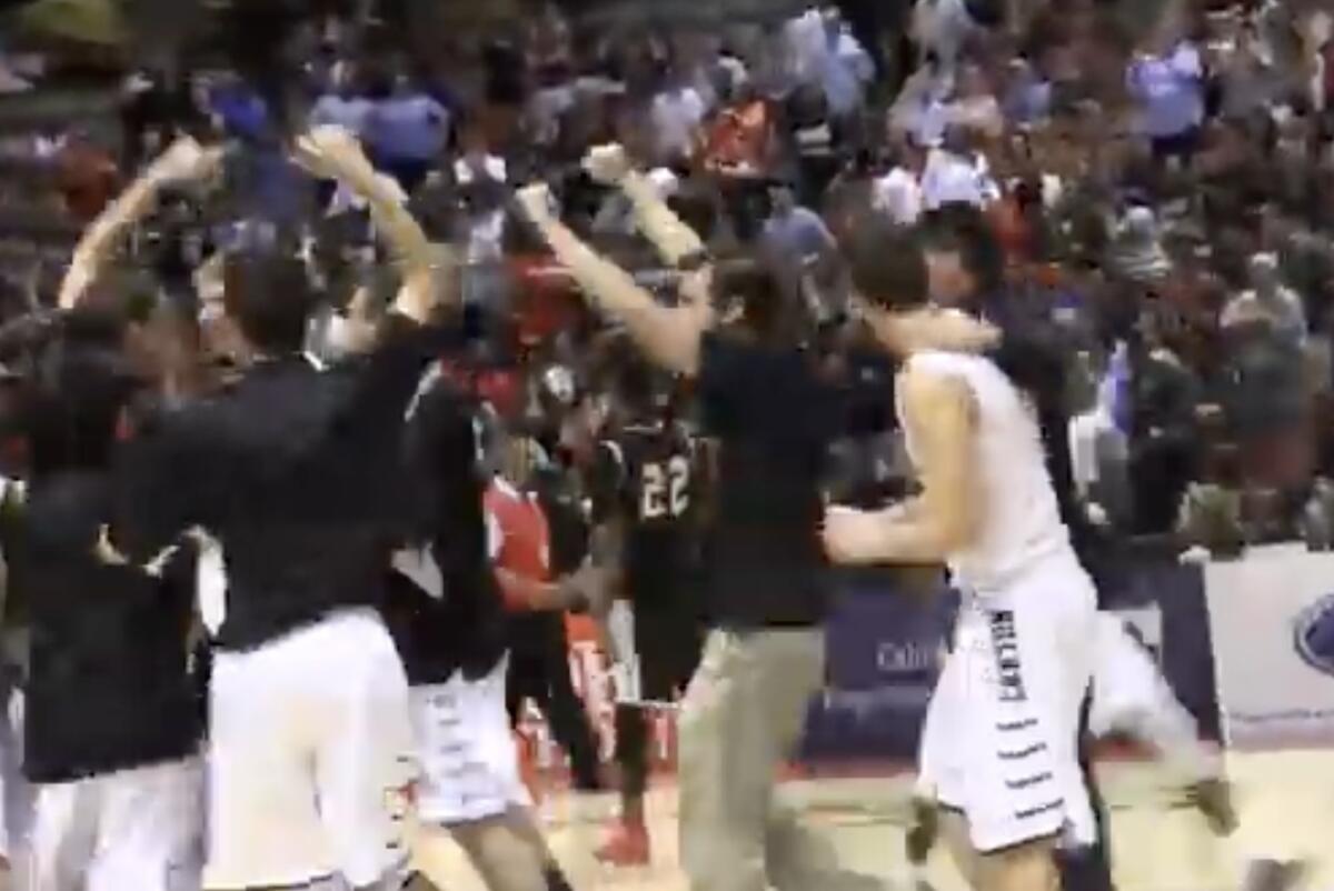 Anaheim Canyon players celebrate after winning the 2015 Division 2AA championship with a 28-point comeback win over Lawndale.
