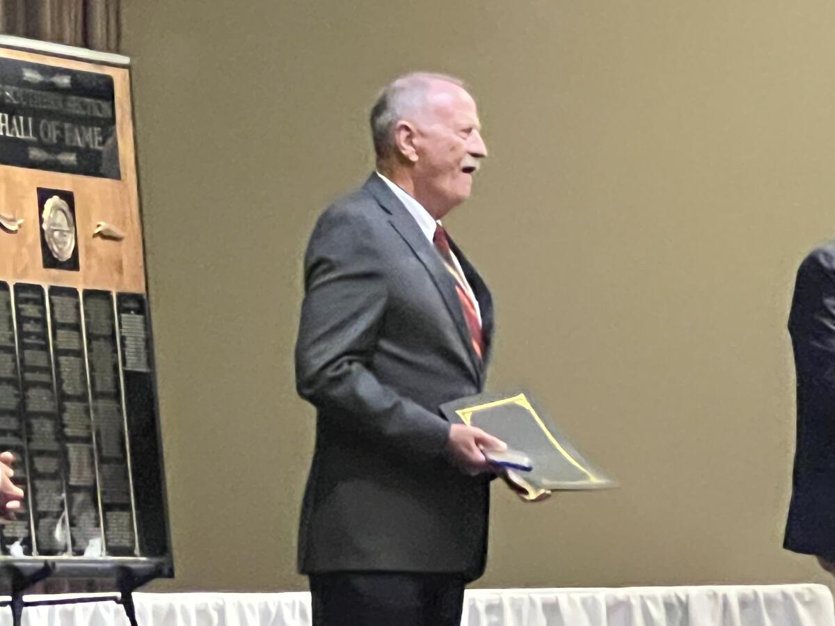 Harry Welch, the only football coach to win three state titles at three different schools, w