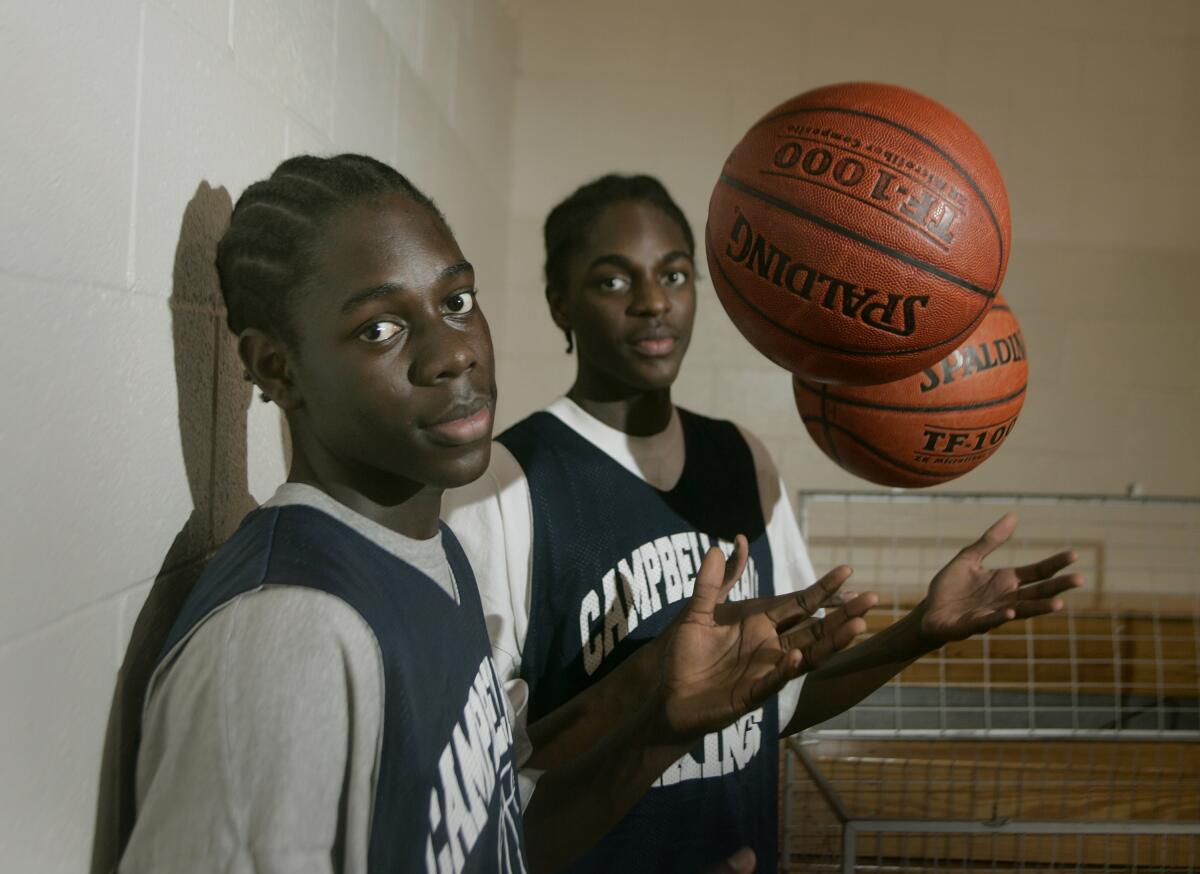 Brothers, Jrue and Justin Holiday of the Campbell Hall basketball team in 2005.