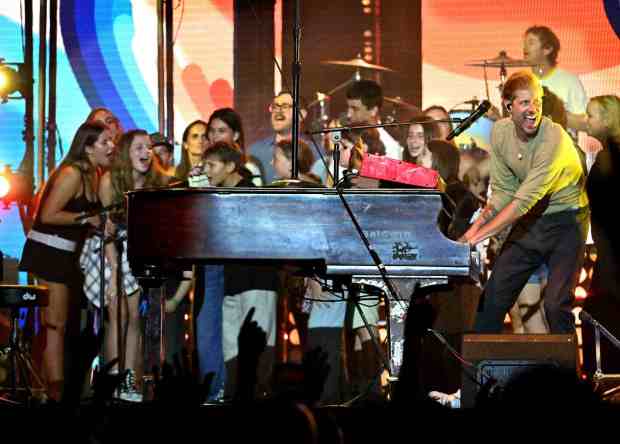 Andrew McMahon performs his last song of the night as kids from the families of band members gather around the piano for the Three Pianos tour, August 22, 2026, at the new F&M Bank Amphitheater of Long Beach. (Photo by Steven Georges, Contributing Photographer)