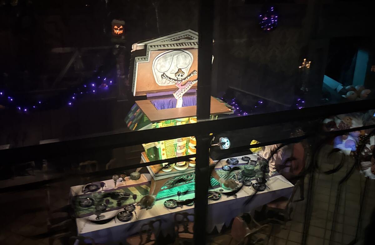 A photo of the Haunted Mansion's new gingerbread house, as snapped from my ride vehicle.