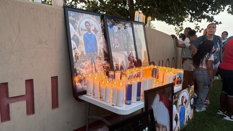 Candles, balloons and prayers filled the front of Independence High School as Bakersfield residents gathered for a vigil honoring 17-year-old Levi Brown. PHOTO: KBAK/KBFX