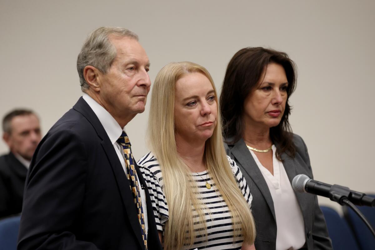 Tommi Jo Mejer, center, 50, of Aliso Viejo, appears in court with attorneys Paul Meyer, left, and Lolita Kirk, right.