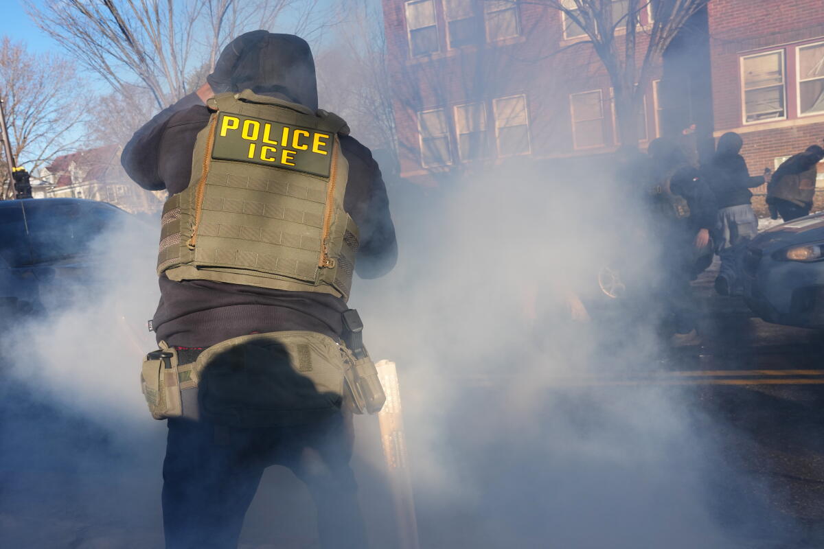 Tear gas deployed amid protesters near scene where Renee Good was fatally shot by ICE officer Jan. 13, 2026, in Minneapolis.