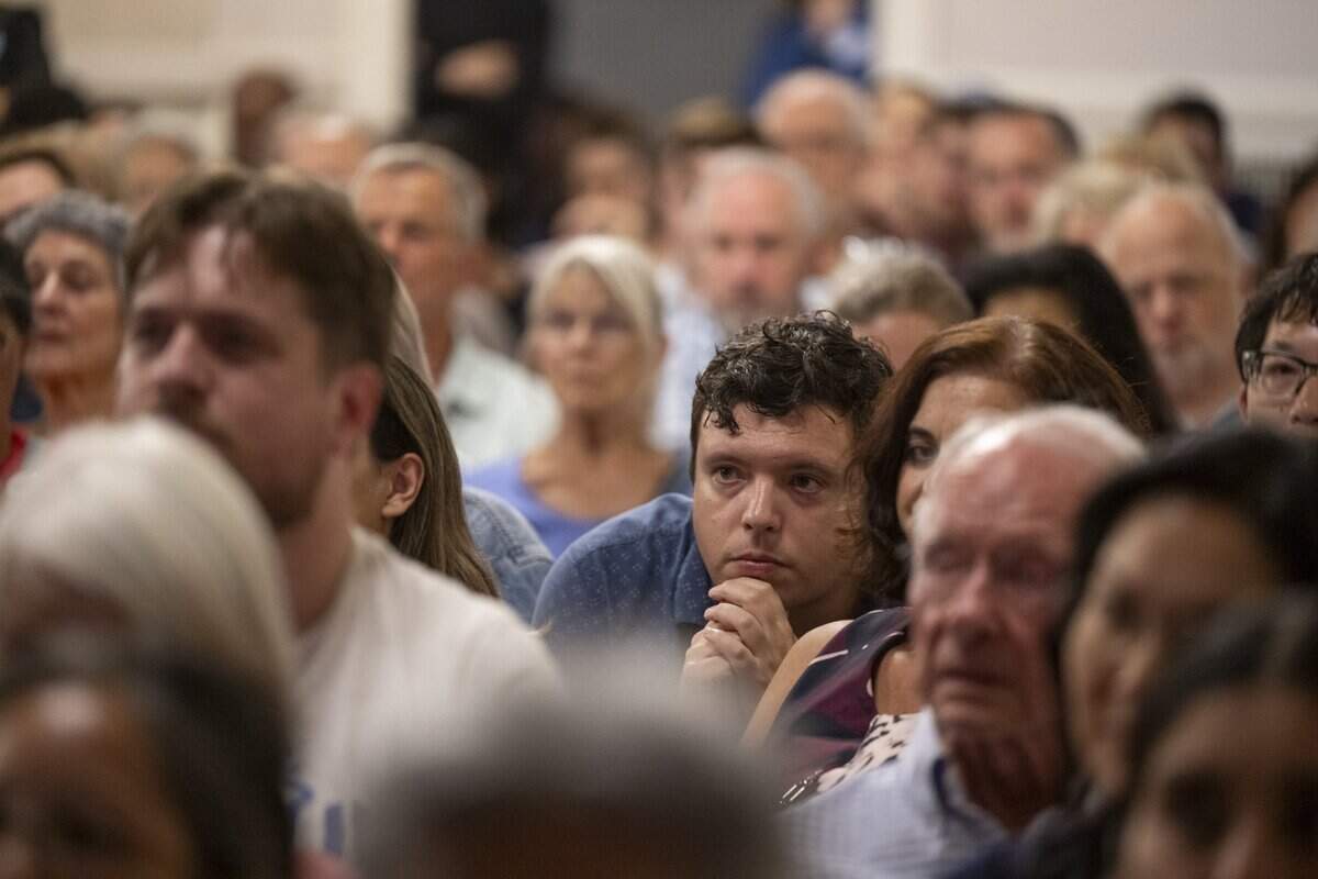 Spectators listen as Congressional District 7 candidates Doris Matsui and Mai Vang participate in a debate-style forum at the Coloma Center Auditorium in Sacramento on Thursday, Aug. 27, 2026.