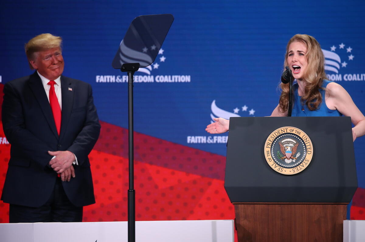 Natalie Harp speaks after being called onstage by President Trump in 2019.