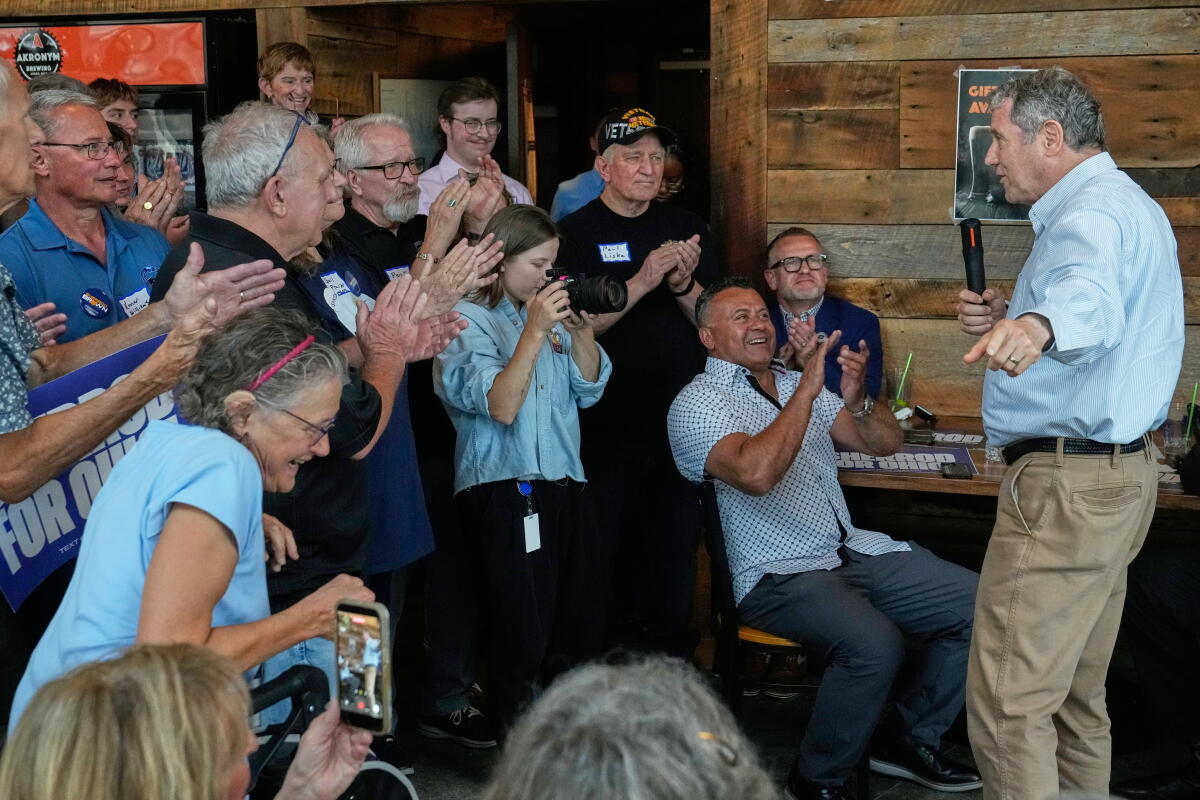 Supporters applaud Democratic Ohio Senate candidate Sherrod Brown
