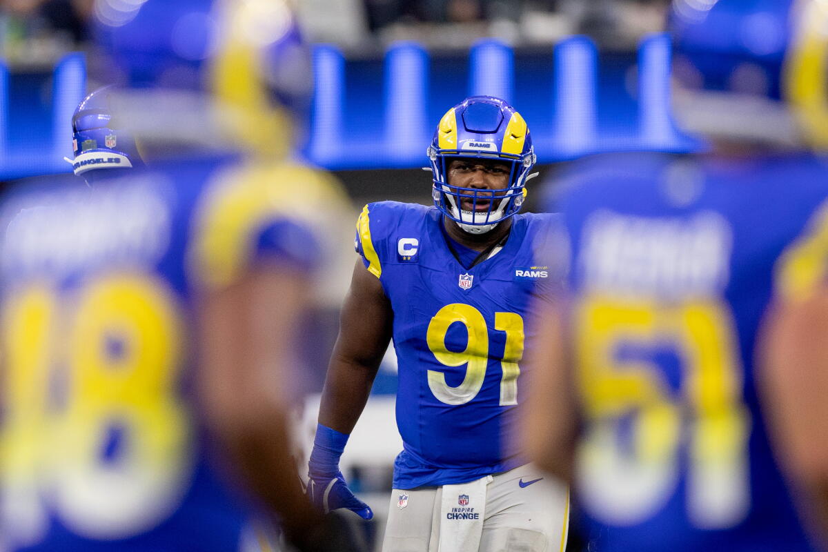 Rams defensive lineman Kobie Turner stands on the field during a win over the Detroit Lions in December.