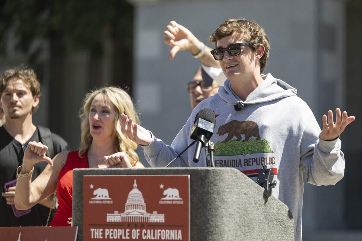 Online political influencer Nick Shirley speaks during a news conference in opposition to Assembly Bill 2624, which opponents call the "Stop Nick Shirley Act," at the California Capitol in Sacramento on Wednesday. The bill would protect the confidentiality of immigration service providers.