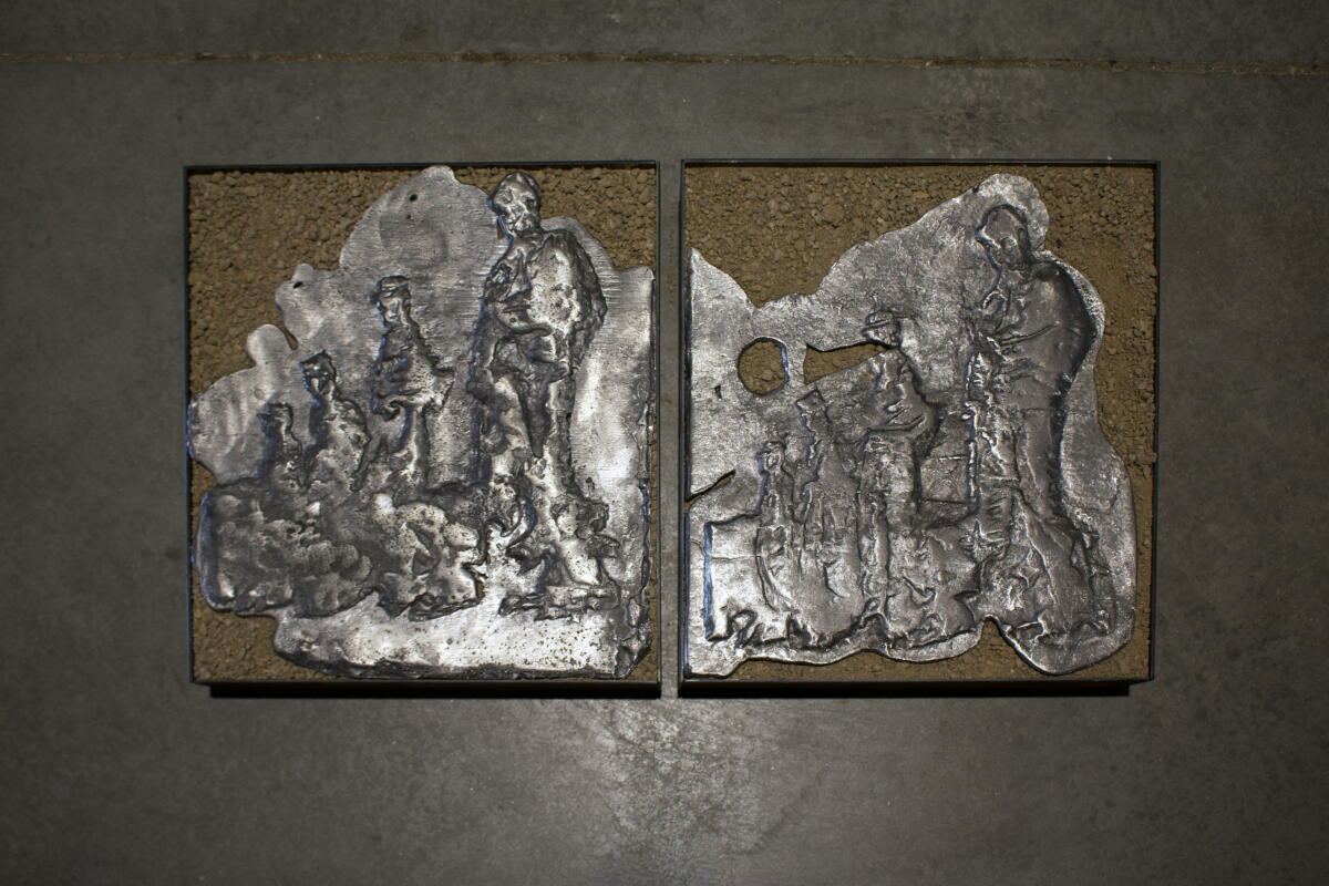 Relief images in aluminum waste salvaged from a former missile site are part of “A Boundary Meant to Separate".