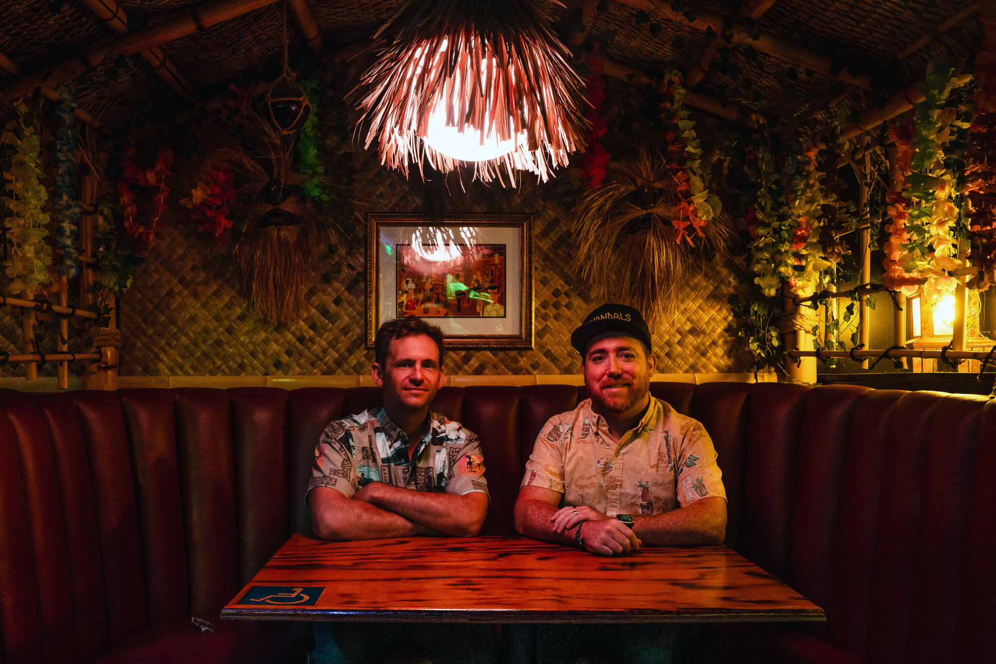 Directors Max Well, left, and Alex Lamb of "The Donn of Tiki" at Tustin's Stowaway, a modern take on the tiki bar formula.