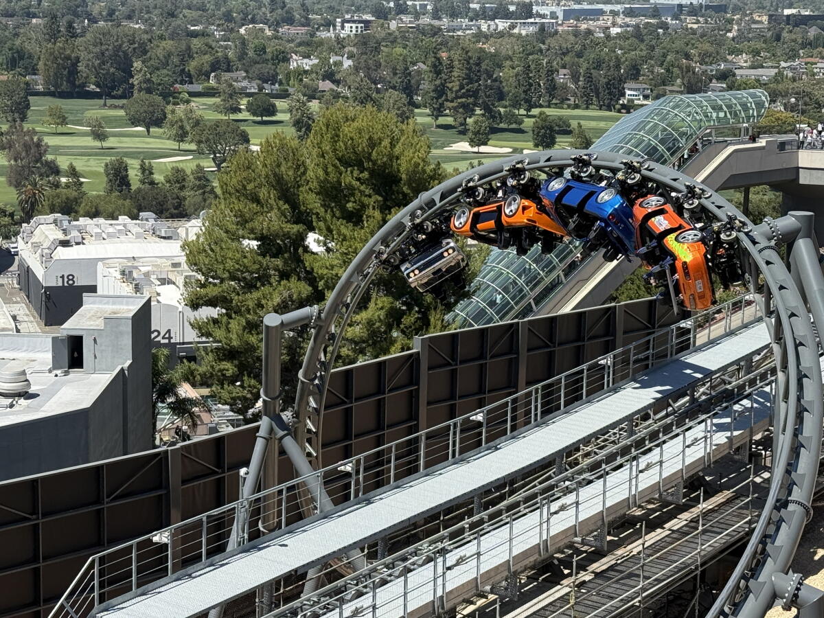 Coaster cars on a loop.