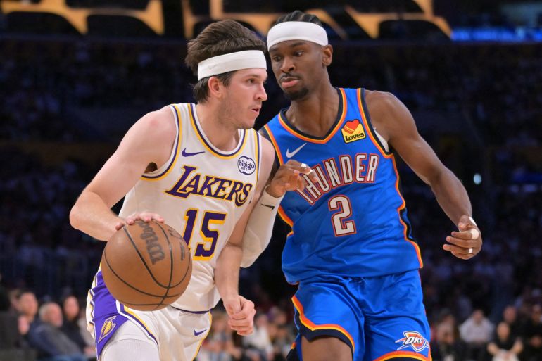 Los Angeles Lakers guard Austin Reaves, left, just re-signed with the Lakers on a four-year, $185m maximum contract extension last month