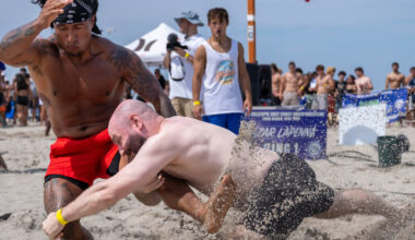 Edison Tigre, left, and Greg Richman tangled at the Jones & Gillespie East Coach Beach Wrestling Tournament last Saturday.