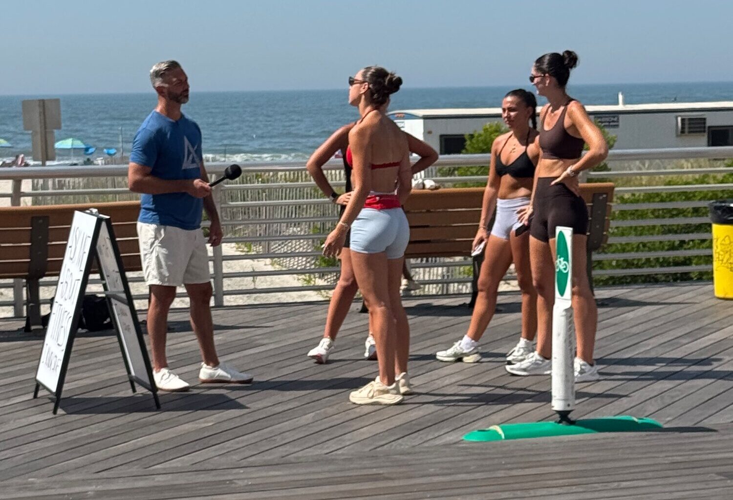 The longtime fitness professional has set up along the boardwalk to answer health and fitness questions from the public.