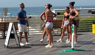 The longtime fitness professional has set up along the boardwalk to answer health and fitness questions from the public.
