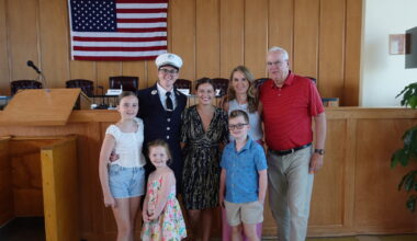 Catherine Lewis, third from left, became the first female career Fire Department lieutenant in Long Beach. Promoted on July 30, she was surrounded by family and friends.