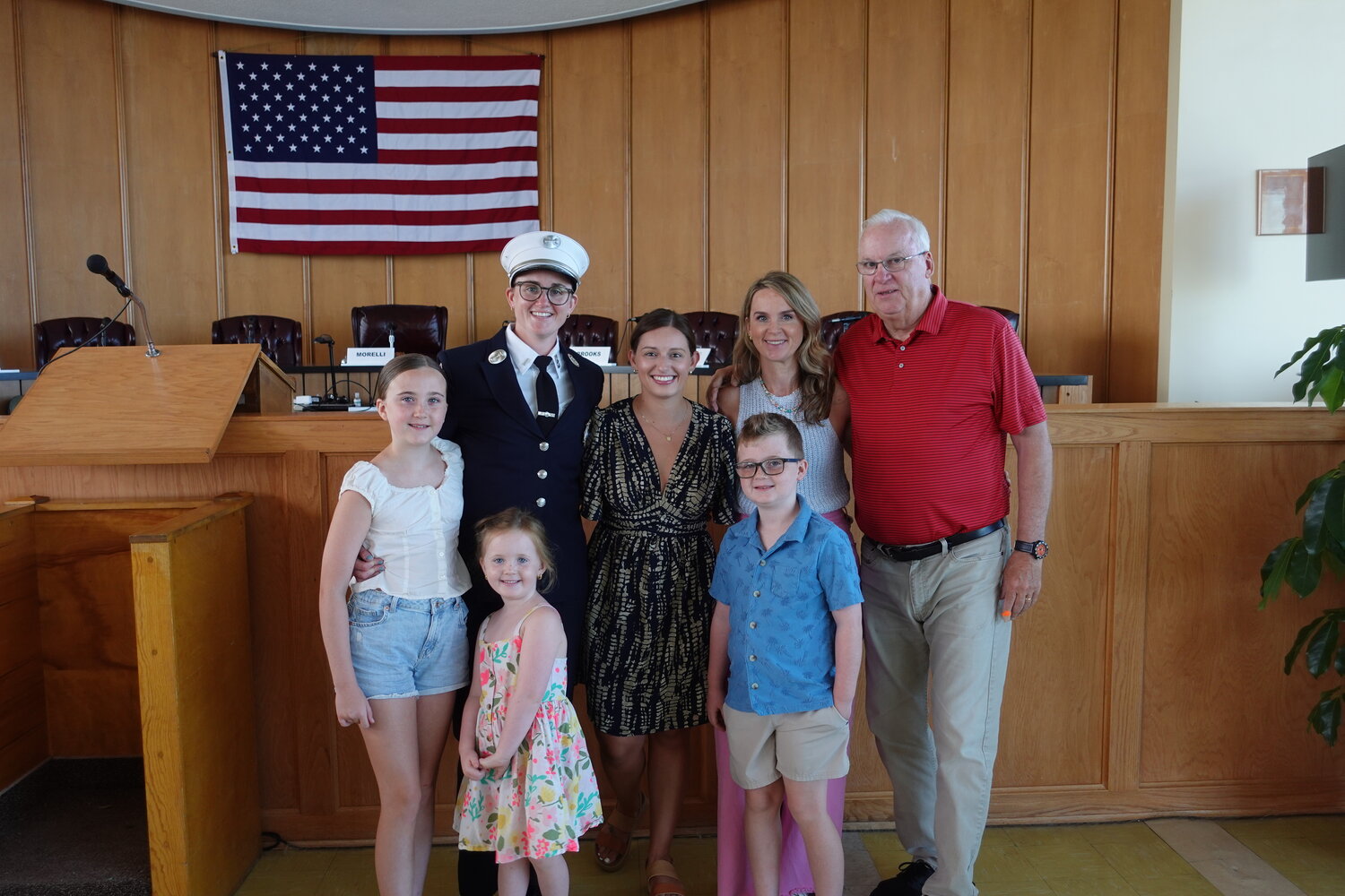 Catherine Lewis, third from left, became the first female career Fire Department lieutenant in Long Beach. Promoted on July 30, she was surrounded by family and friends.
