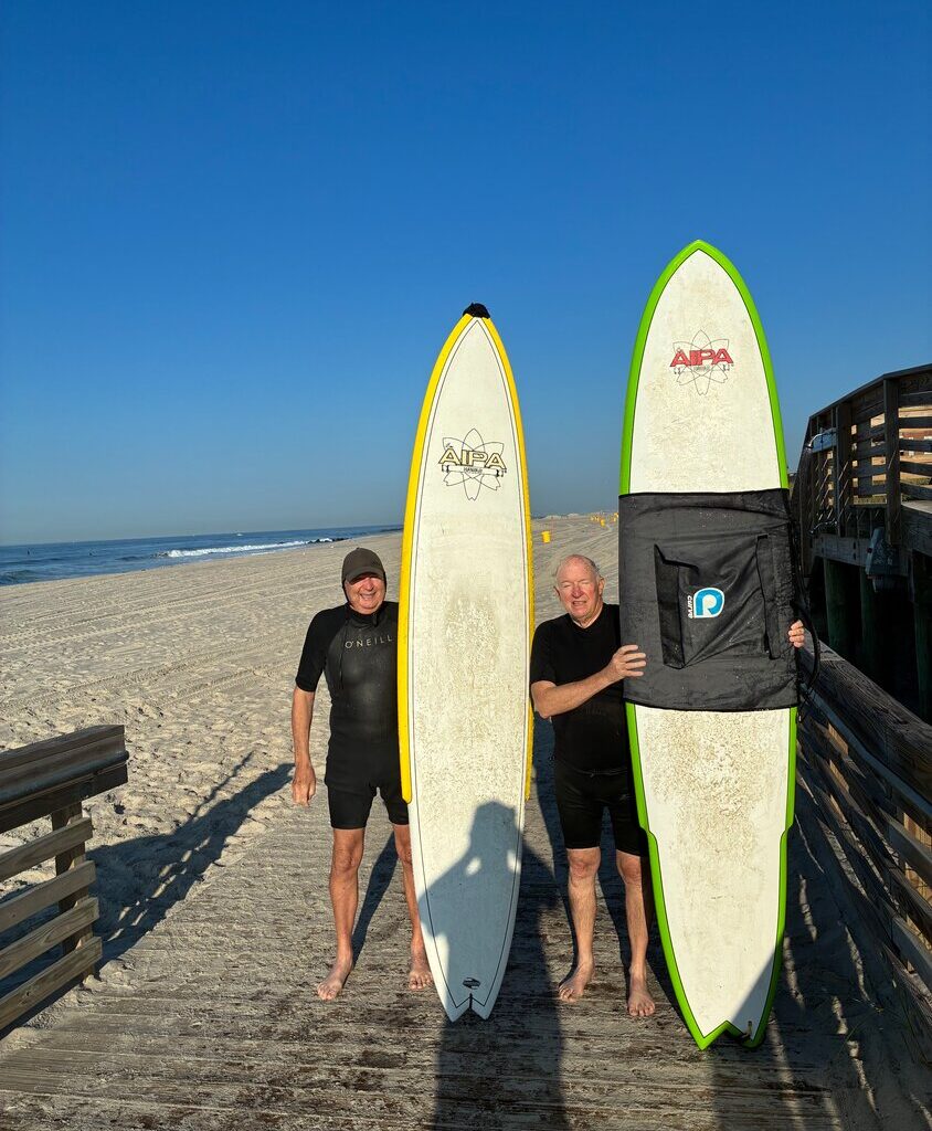 Dennis Carey, right, spends most of his summer days in Long Beach. He grew up on Wisconsin Street with longtime friend Rick Barry.