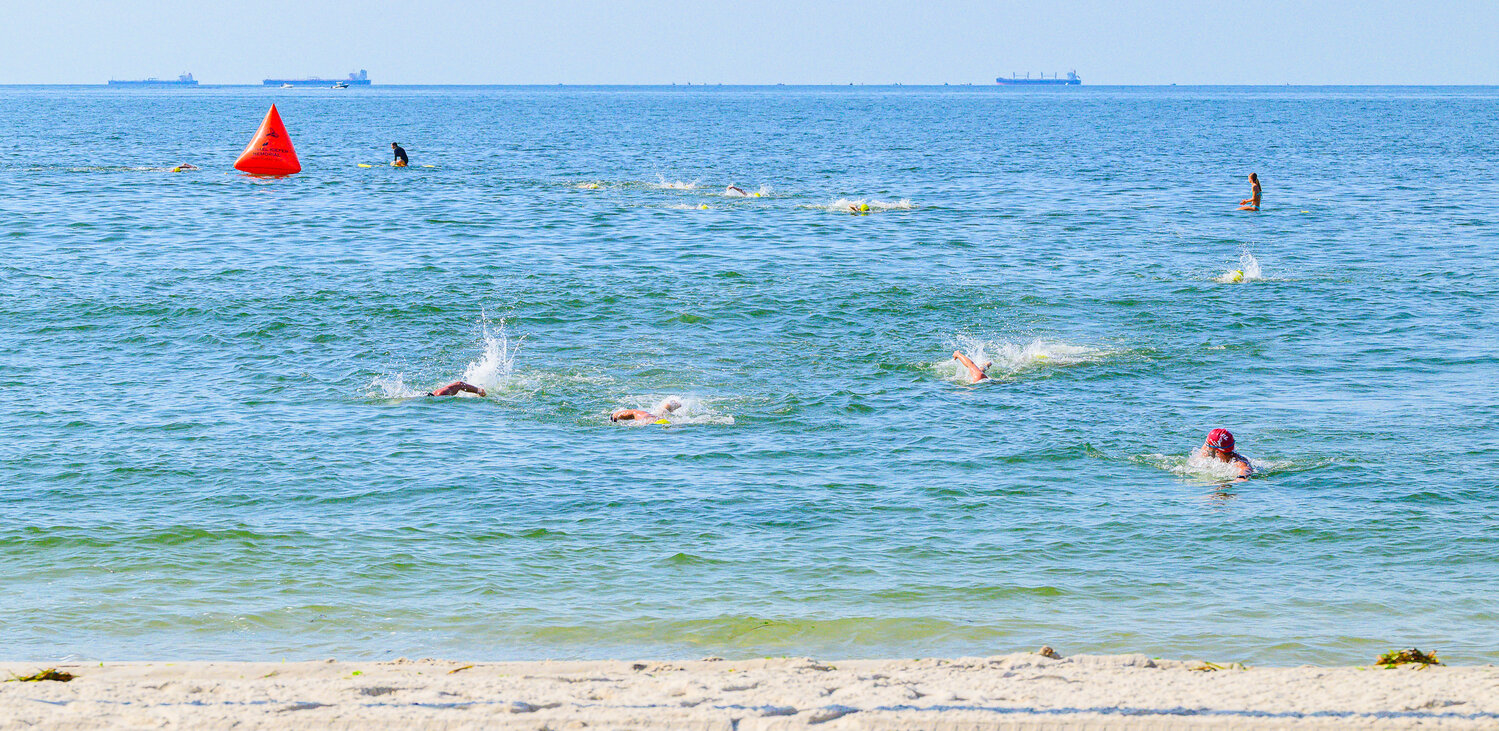 Nearly 150 swimmers made the one-mile ocean swim to honor Long Beach lifeguards who&rsquo;ve died over the years. Participants from 14 to 81 years old completed the challenge.