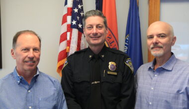 Acting Police Commissioner Richard DePalma, center, in 2024 during his swearing-in ceremony, with Deputy City Manager Phil Ragona, left, and City Manager Dan Creighton.