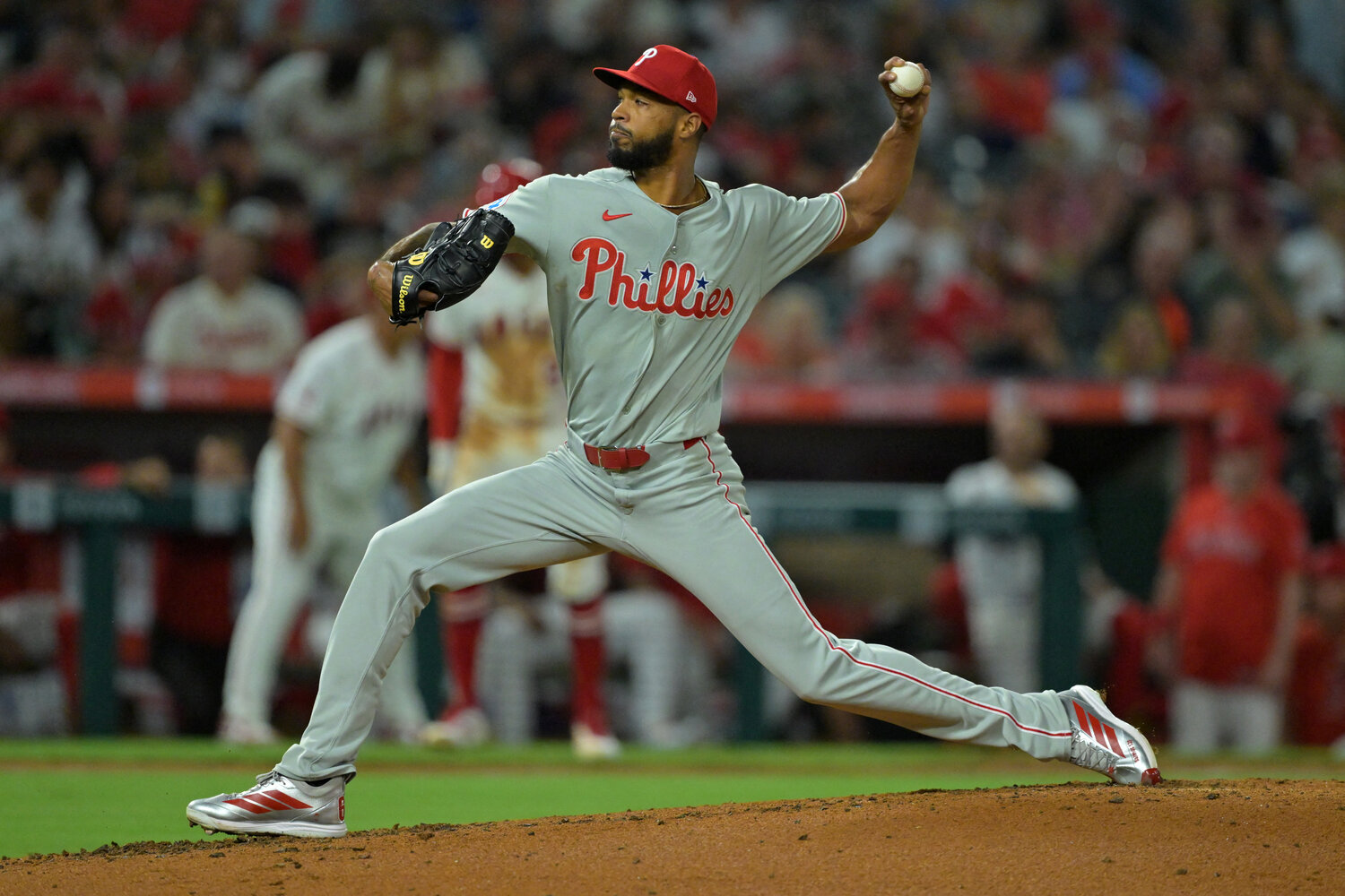 Philadelphia Phillies starting pitcher Cristopher S&aacute;nchez (61) delivers to the plate during the second inning against the Los Angeles Angels at Angel Stadium.