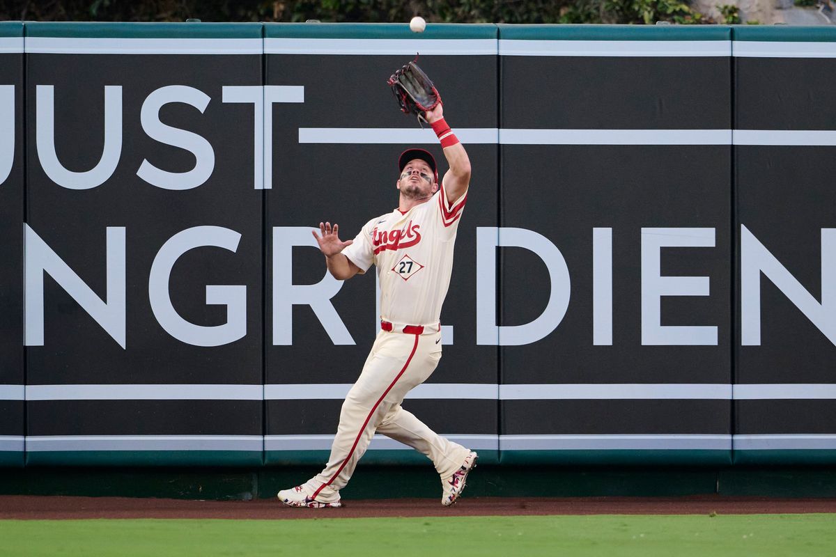 The Los Angeles Angels Mike Trout #27 catches a fly ball during an MLB game against The Milwaukee Brewers on July 31st, 2026 at Angel Stadium in Anaheim, California.