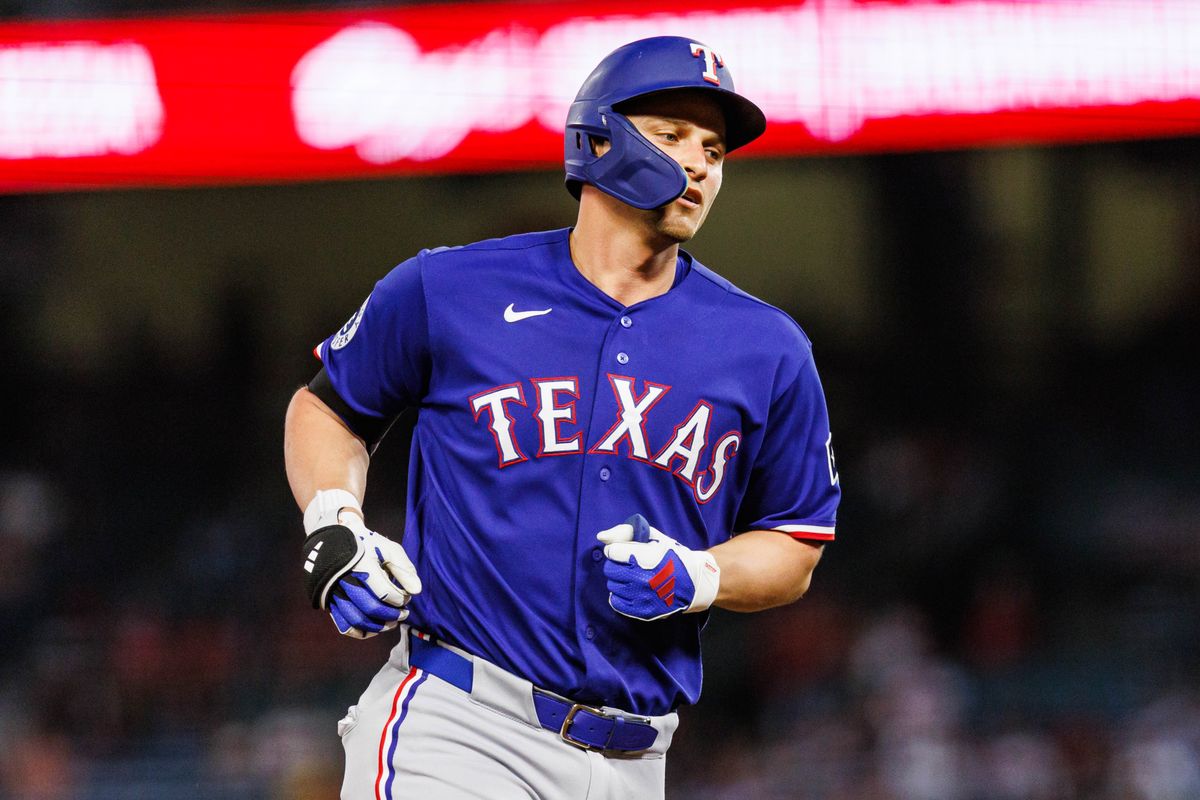 Corey Seager #5 of the Texas Rangers runs the bases after hitting a home run during an MLB game against the Los Angeles Angels on August 12, 2026 at Angel Stadium in Anaheim, California. Corey Seager #5 of the Texas Rangers runs the bases after hitting a home run during an MLB game against the Los Angeles Angels on August 12, 2026 at Angel Stadium in Anaheim, California.