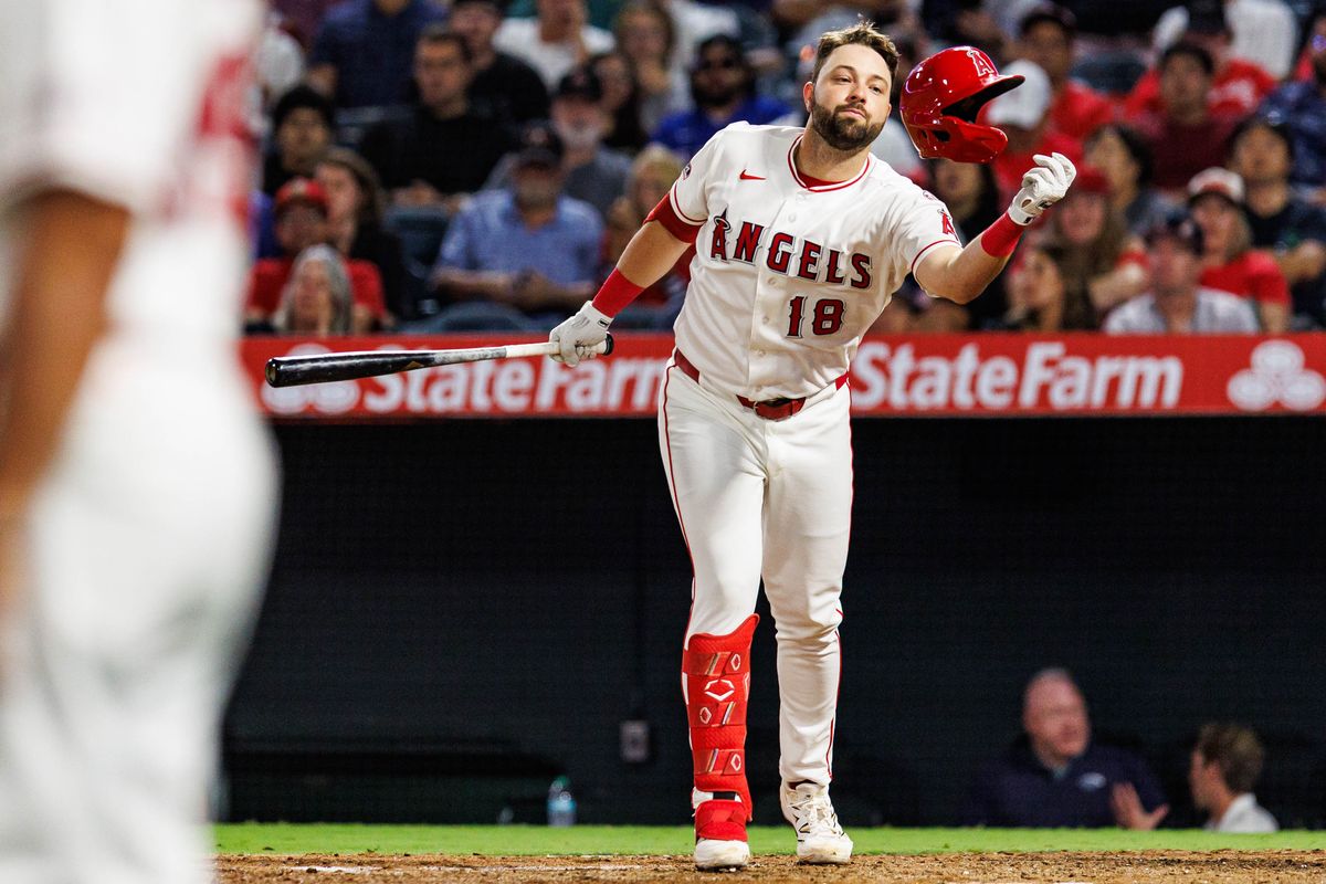 Nolan Schanuel #18 of the Los Angeles Angels loses his helmet during an MLB game against the Texas Rangers on August 12, 2026 at Angel Stadium in Anaheim, California. Nolan Schanuel #18 of the Los Angeles Angels loses his helmet during an MLB game against the Texas Rangers on August 12, 2026 at Angel Stadium in Anaheim, California.