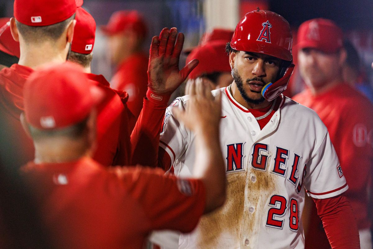 Jose Siri #28 of the Los Angeles Angels is welcomed back to the dugout during an MLB game against the Texas Rangers on August 12, 2026 at Angel Stadium in Anaheim, California. Jose Siri #28 of the Los Angeles Angels is welcomed back to the dugout during an MLB game against the Texas Rangers on August 12, 2026 at Angel Stadium in Anaheim, California.
