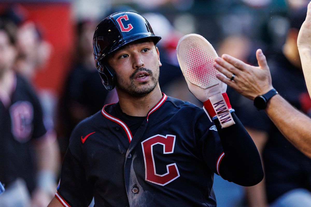 Steven Kwan #38 of the Cleveland Guardians is welcomed after scoring a run during an MLB game against the Los Angeles Angels on August 24, 2026 at Angel Stadium in Anaheim, California. Steven Kwan #38 of the Cleveland Guardians is welcomed after scoring a run during an MLB game against the Los Angeles Angels on August 24, 2026 at Angel Stadium in Anaheim, California.