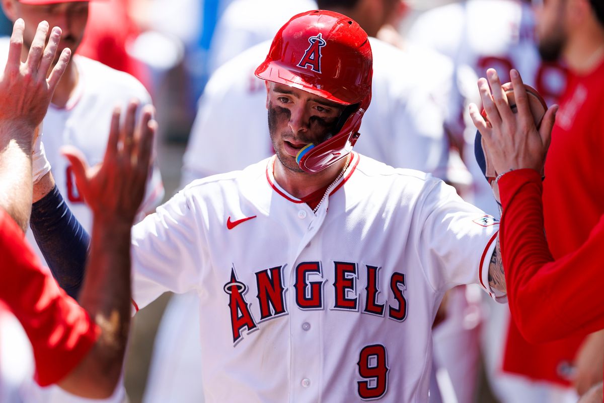 Zach Neto #9 of the Los Angeles Angels celebrates in the dugout during the game against the Cleveland Guardians at Angel Stadium of Anaheim on August 26, 2026 in Anaheim, California.