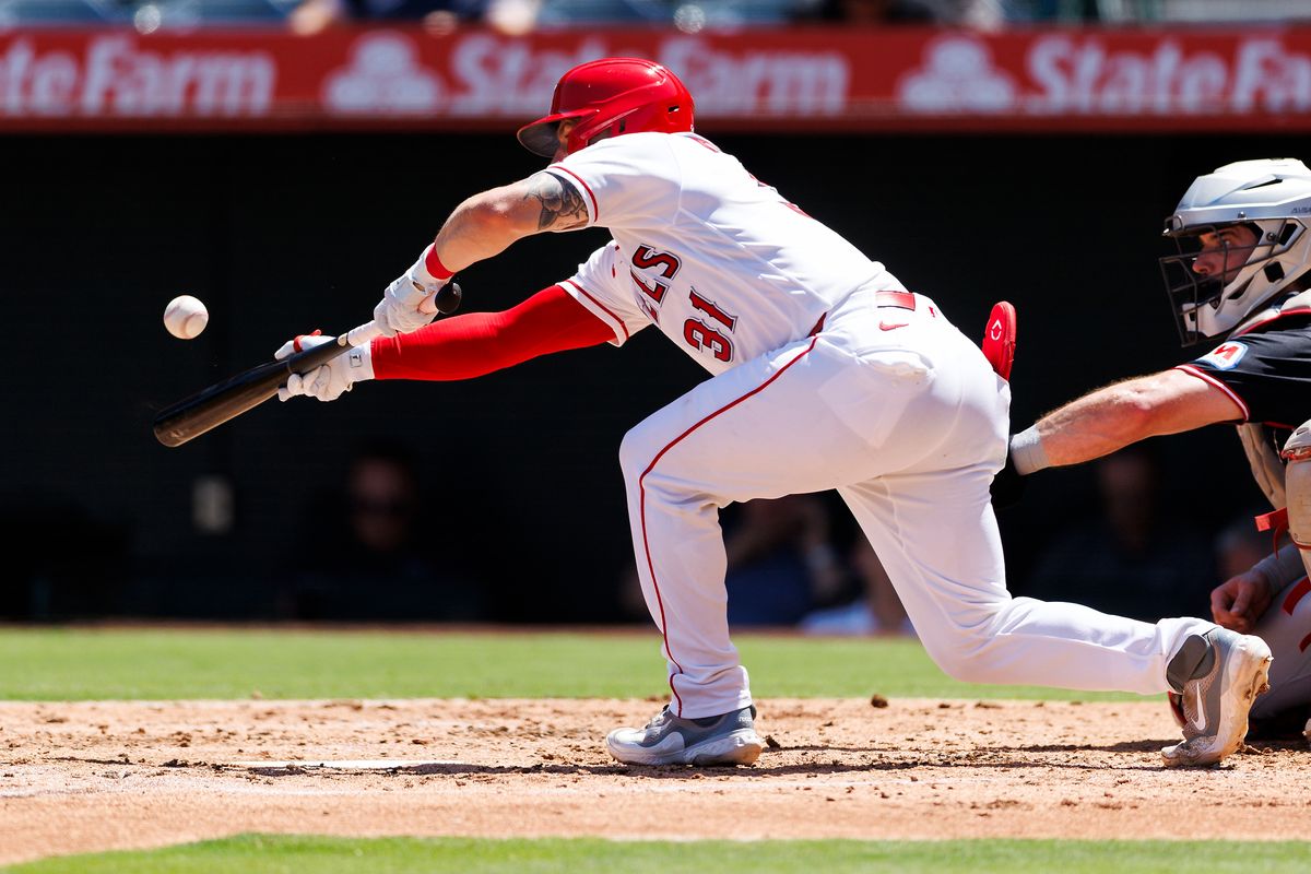 Tyler Heineman #31 of the Los Angeles Angels bunts during the game against the Cleveland Guardians at Angel Stadium of Anaheim on August 26, 2026 in Anaheim, California. 