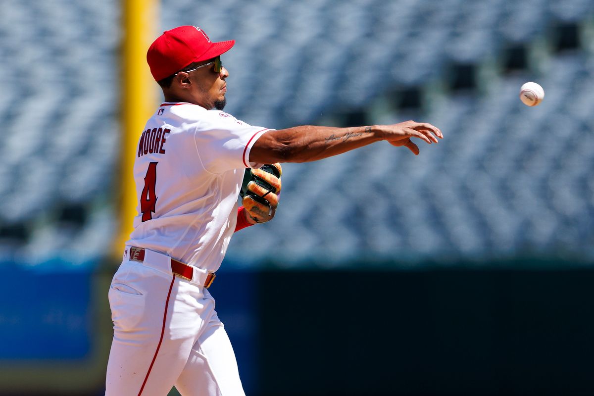 Christian Moore #4 of the Los Angeles Angels throws to first base during the game against the Cleveland Guardians at Angel Stadium of Anaheim on August 26, 2026 in Anaheim, California. 
