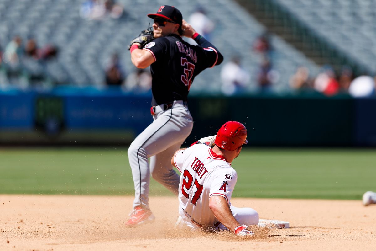 Mike Trout #27 of the Los Angeles Angels slides into second base during the game against the Cleveland Guardians at Angel Stadium of Anaheim on August 26, 2026 in Anaheim, California. 