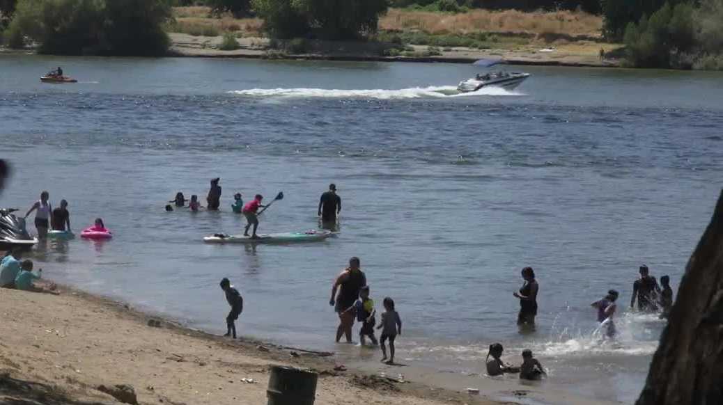 Sacramento families seek relief from heat in American River