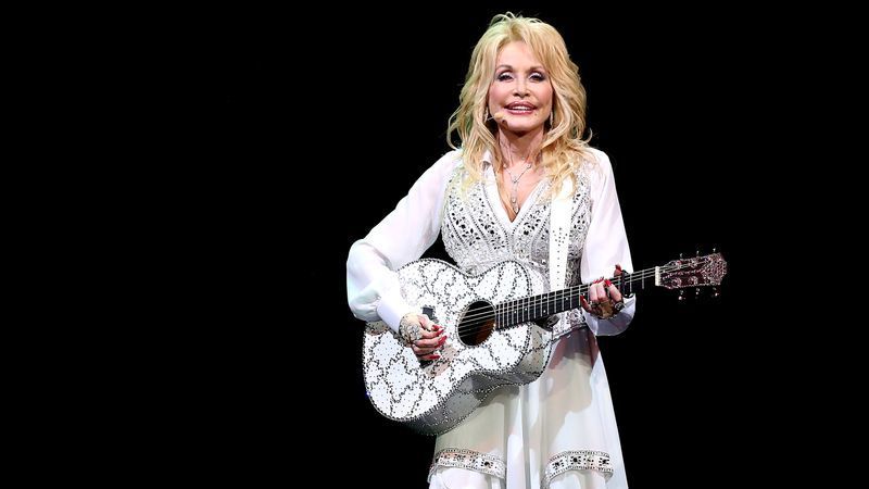 MELBOURNE, AUSTRALIA - FEBRUARY 11: Dolly Parton performs on stage at Rod Laver Arena on February 11, 2014 in Melbourne, Australia. (Photo by Graham Denholm/Getty Images)