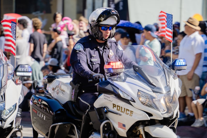 Los Angeles Police Department’s Precision Motorcycle Drill Team showcases formation riding to open the Grand Parade.