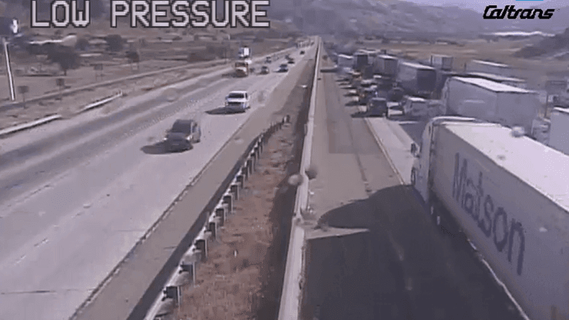 {p}Traffic continues to snarl on northbound Interstate 5 near Grapevine Road after a semi-truck caught on fire at around 1 a.m. Friday morning. PHOTO: Caltrans{/p}