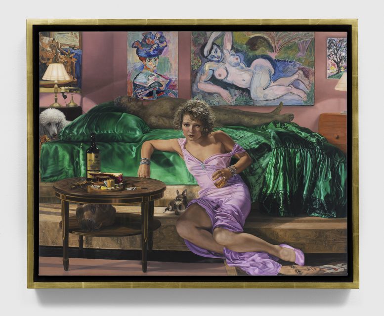 A woman in a lavender dress lounges on a bed in a colorful, cluttered room with paintings, green bedding, a white dog, a brown animal, and a table with wine and food.
