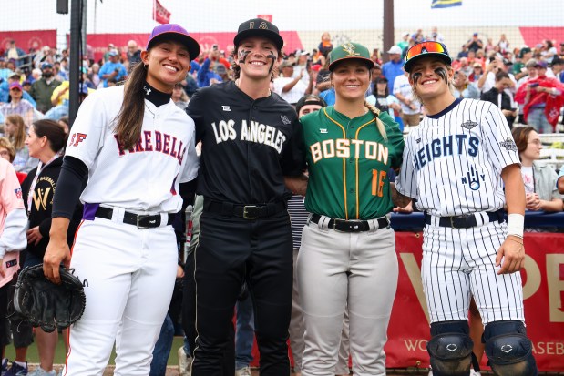 SPRINGFIELD, ILLINOIS - AUGUST 01: Kelsie Whitmore #3 of the San Francisco Firebells, Ashton Lansdell #1 of the Los Angeles Queens, Alli Schroder #16 of the Boston Hunters, and Danae Benites #2 of the New York Heights pose for a photo before the Women's Pro Baseball League Opening Day between New York Heights and the Los Angeles Queens at Robin Roberts Stadium on August 01, 2026 in Springfield, Illinois. (Photo by Jessie Alcheh/Getty Images)