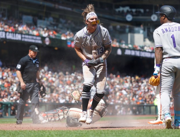 Colorado Rockies' Zac Veen (13) celebrates after scoring a run off of a wild pitch against the San Francisco Giants in the sixth inning at Oracle Park in San Francisco, Calif., on Sunday, Aug. 16, 2026. (Nhat V. Meyer/Bay Area News Group)