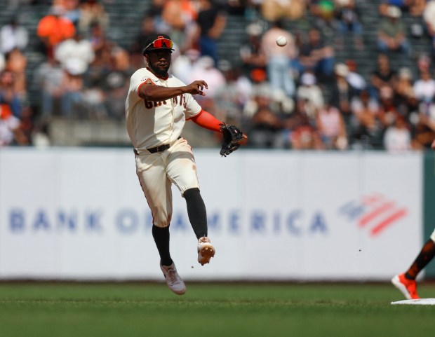 San Francisco Giants' Basabe Osleivis (39) throws to first base for an out on a ball hit by Colorado Rockies' Ezequiel Tovar (14) in the seventh inning at Oracle Park in San Francisco, Calif., on Sunday, Aug. 16, 2026. (Nhat V. Meyer/Bay Area News Group)