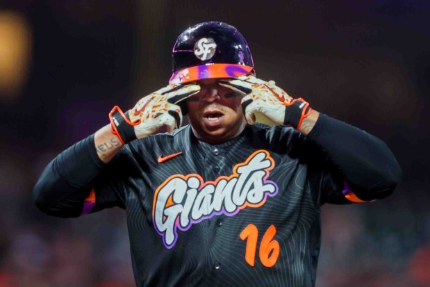 San Francisco Giants' Rafael Devers (16) celebrates his solo home run against the Cincinnati Reds in the fifth inning of their MLB game at Oracle Park in San Francisco, Calif., on Tuesday, Aug. 25, 2026. (Ray Chavez/Bay Area News Group)