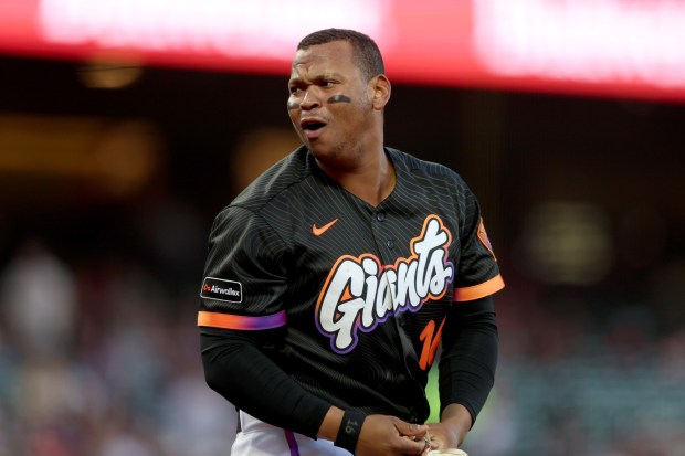 San Francisco Giants' Rafael Devers (16) reacts after striking out against the Cincinnati Reds in the second inning of their MLB game at Oracle Park in San Francisco, Calif., on Tuesday, Aug. 25, 2026. (Ray Chavez/Bay Area News Group)