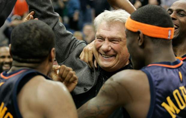 Golden State Warriors coach Don Nelson celebrates with his team after breaking the record for career coaching victories after the Warriors beat the Minnesota Timberwolves 116-107 in an NBA basketball game Wednesday, April 7, 2010, in Minneapolis. It was Nelson's 1,333rd win, moving him past Lenny Wilkens. (AP Photo/Paul Battaglia)