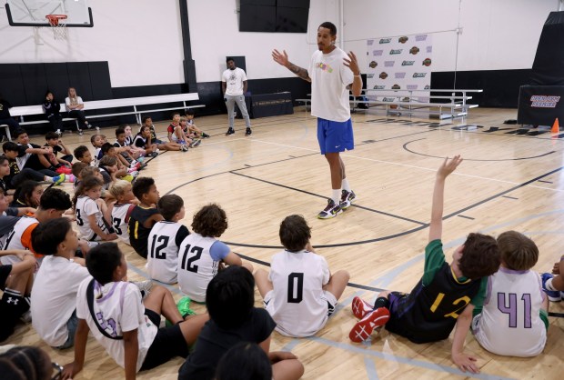 Former Golden State Warriors player and Oakland native Juan Toscano-Anderson talks with youth at the Golden State Sports Academy Basketball Camp at Open Gym Premier in Oakland, Calif., on Tuesday, July 28, 2026. (Jane Tyska/Bay Area News Group)