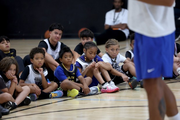 Former Golden State Warriors player and Oakland native Juan Toscano-Anderson talks with youth at the Golden State Sports Academy Basketball Camp at Open Gym Premier in Oakland, Calif., on Tuesday, July 28, 2026. (Jane Tyska/Bay Area News Group)